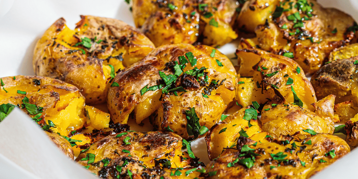 Crispy Smashed Potatoes with Roasted Garlic Olive Oil and Herbs